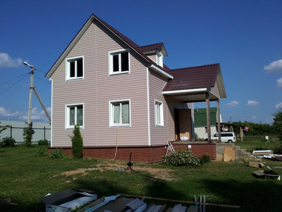 Дом с фасадной штукатуркой